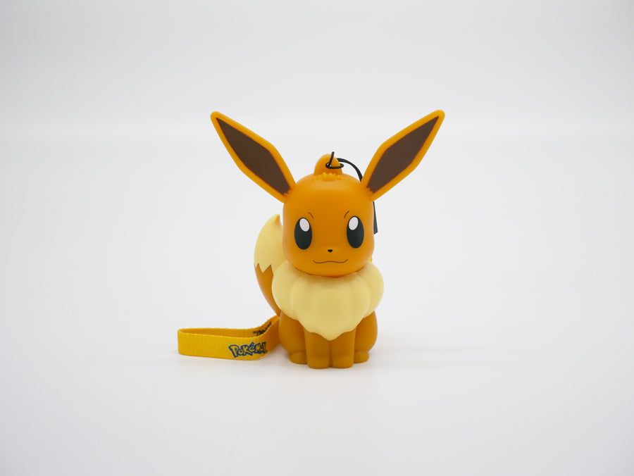 Veilleuse Pokémon Évoli lumineuse, grandes oreilles et collerette crème, avec dragonne
